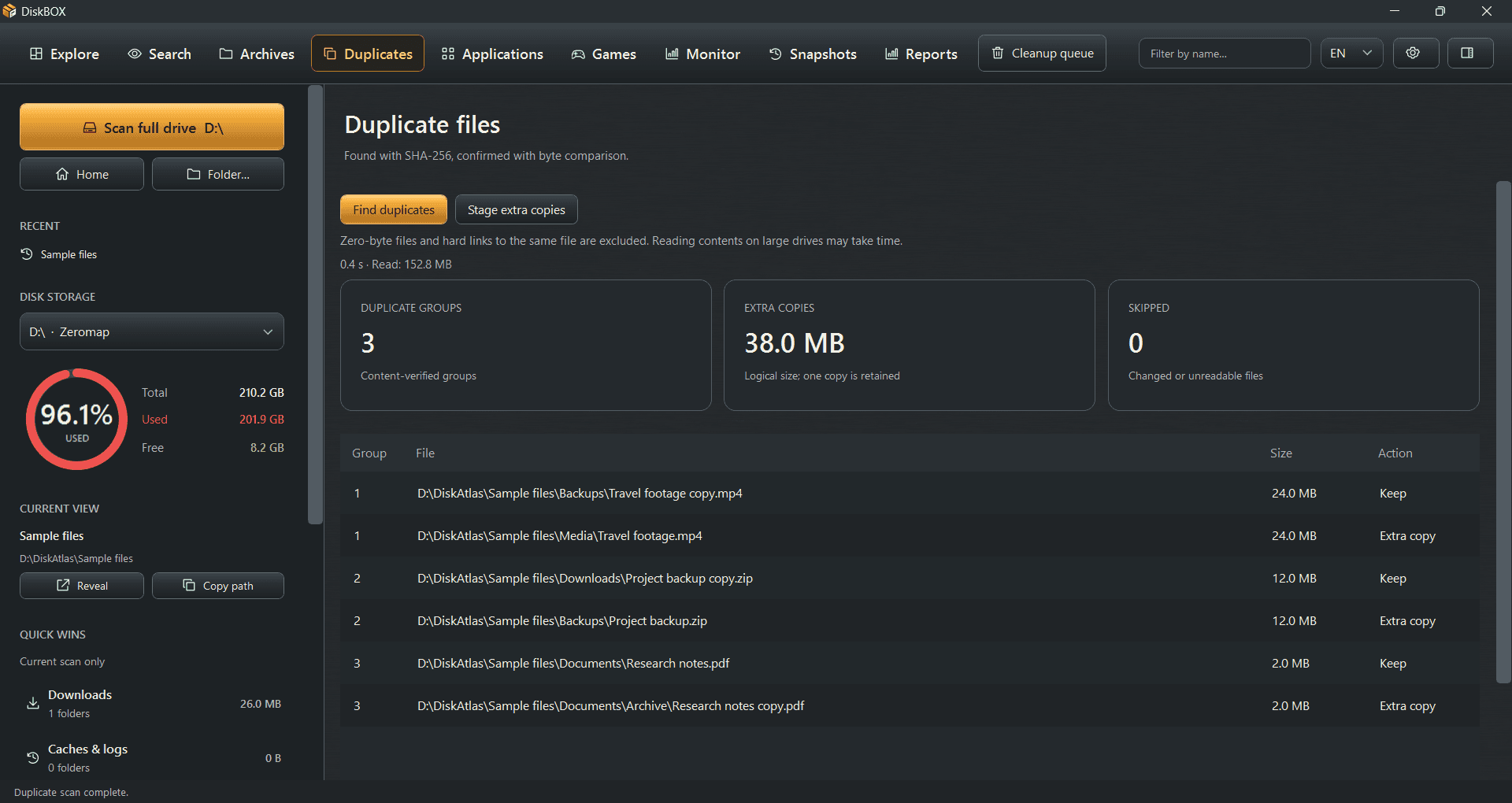 DiskBOX Windows duplicate results showing content-verified groups, extra-copy sizes and full file paths
